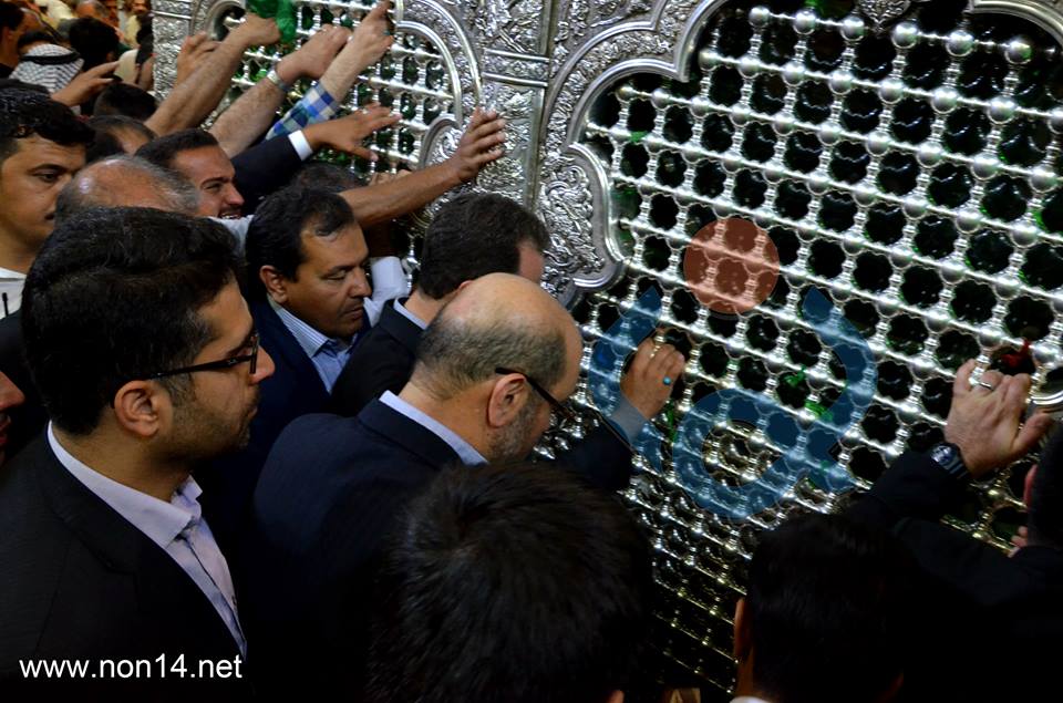 بالصور: وزير الدفاع الايراني يؤدي مراسيم زيارة الامام الحسين