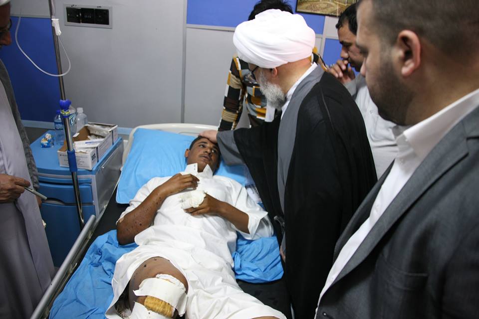 بالصور:ممثل المرجع السيستاني يزور جرحى المتطوعين