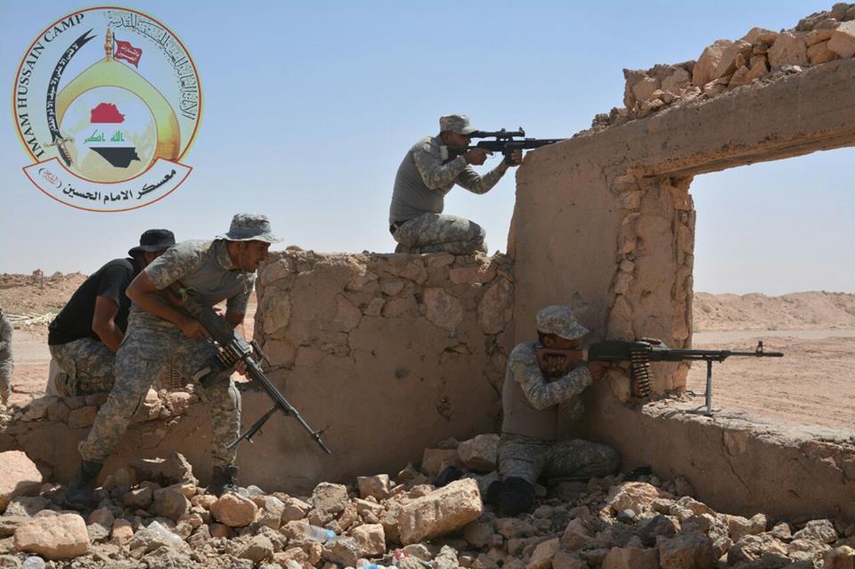 بالصور: تخرج الدورة الاولى لمقاتلي لواء الطفوف بعد تدريبهم على حرب الشوارع في كربلاء