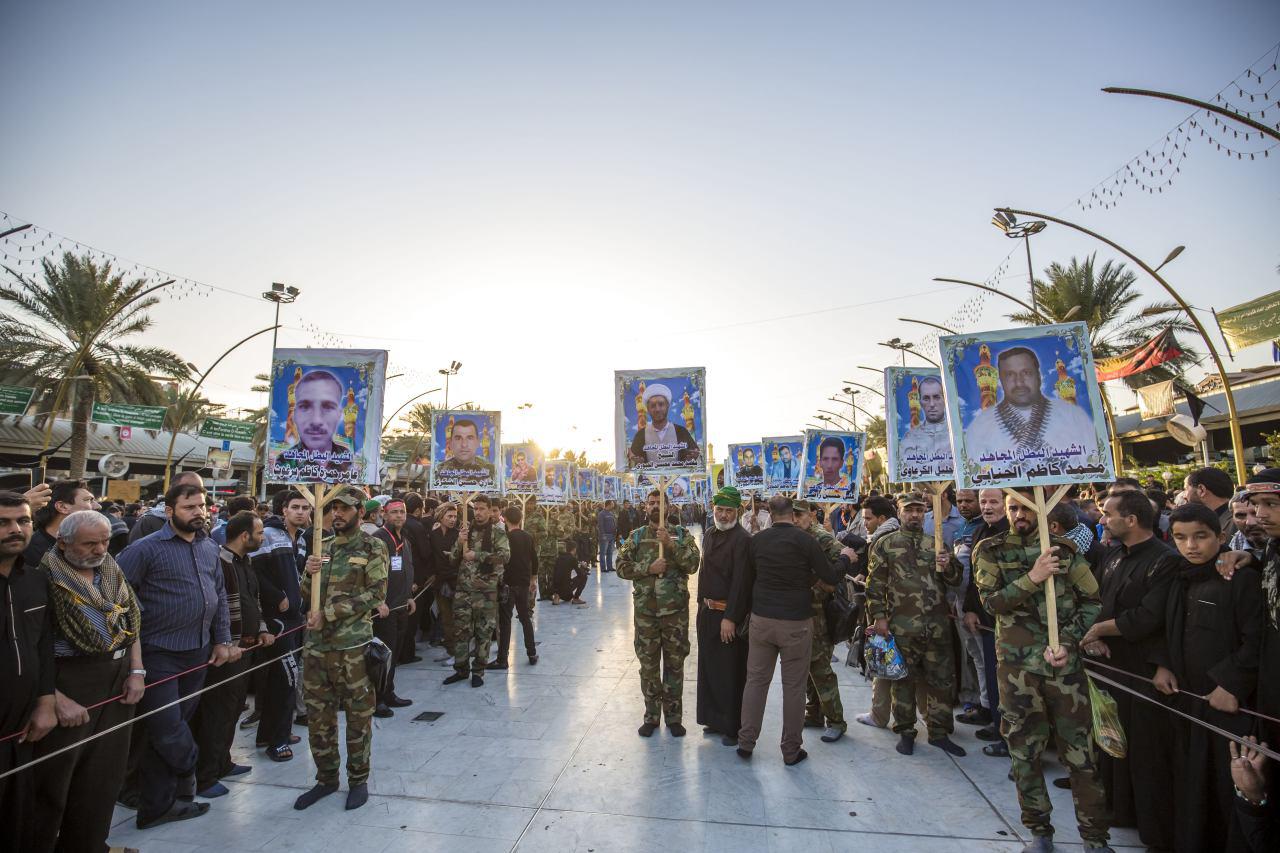 بالصور: شهداء الحشد الشعبي والقوات المسلحة يطوفون في شوارع كربلاء