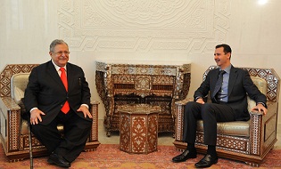 بشار الاسد يرسل باقة ورد الى طالباني ويتمنى له الشفاء العاجل