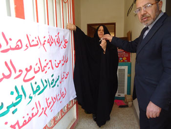 ست يتيمات مهجرات يتسلمن دار سكنية من احدى المؤسسات الخيرية في كربلاء(مصور)