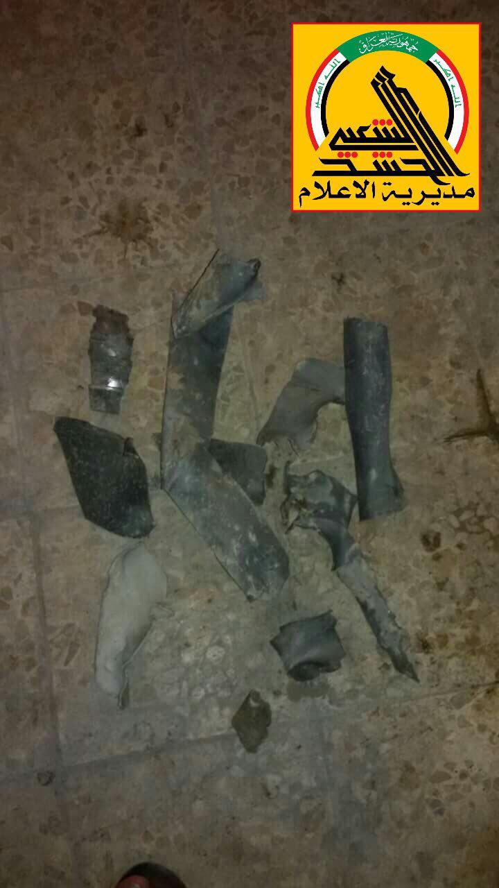 بالصور: اثار قصف قامت بها طائرة مجهولة ضد الحشد الشعبي في جرف النصر