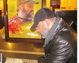 صورة نادرة للسيد حسن نصر الله وهو يزور قبر الشهيد عماد مغنية