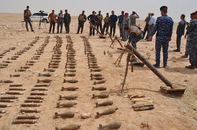العثور على مخبئ للاسلحة والذخائر غرب النجف(مصور)