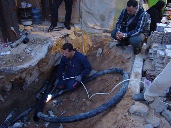 الاستعمال المفرط للاجهزة الكهربائية يحرق احد القابلوات ويقطع التيار الكهربائي عن شارع العباس الرئيس وسط كربلاء(مصور)