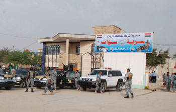 الشرطة في كربلاء تعتقل احد قادة كتائب ثورة العشرين متخفيا بزي رجل دين