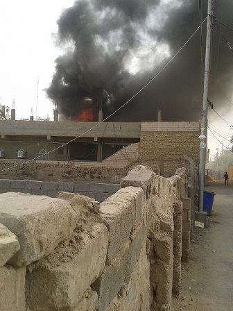 بالصور:حريق باحد الفنادق في مركز كربلاء المقدسة