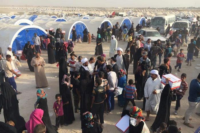 نازحو الفلوجة: السيد السيستاني رمز وحدة العراقيين (مصور)