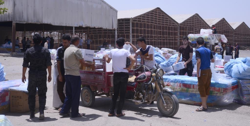 بالصور:المفوضية السامية لشؤون اللاجئين توزع مساعدات إنسانية على 600 عائلة نازحة في محافظة كربلاء المقدسة