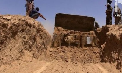 الحشد الوطني: داعش بدأ بحفر خندق شرق الموصل تحسباً من تحرير المدينة