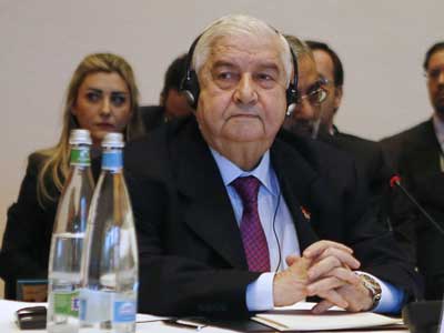 سعود الفيصل يسمي الجربا بفخامة الرئيس السوري والمعلم يخرج من القاعة لدى إلقاء الفيصل لكلمته