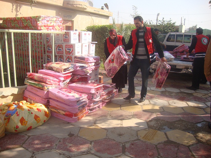جمعية الهلال الاحمر العراقي تقدم مساعدات لشديدي العوق  في كربلاء