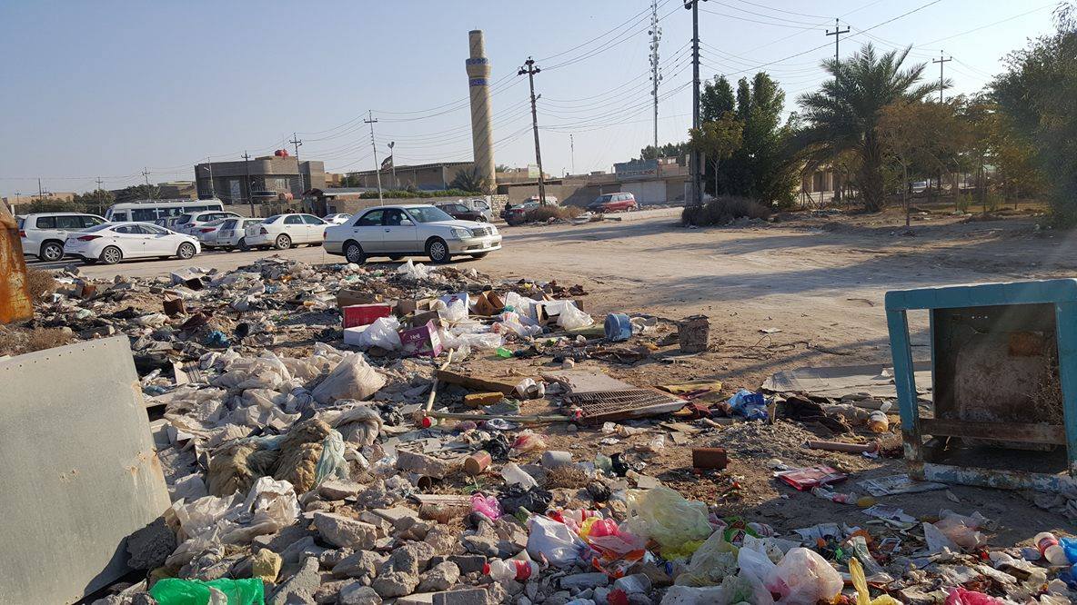 حي التحدي في كربلاء يتحدى النفايات وسوء الخدمات (مصور)
