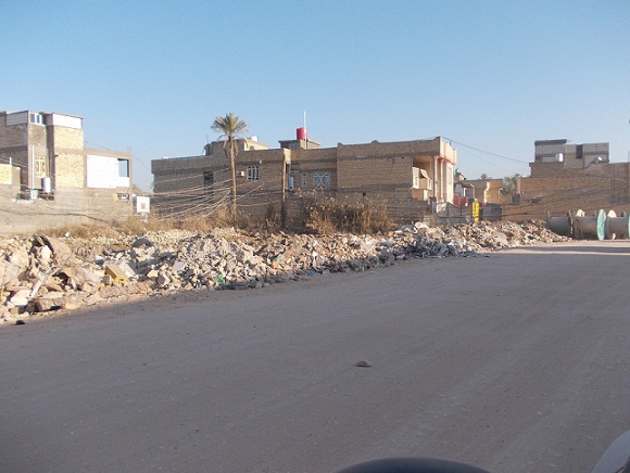 انقاض تشوه شارع رئيسي في كربلاء (مصور)