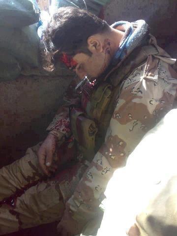 صورة لشهيد عراقي من القوات العسكرية قتل غدرا من قبل المتظاهرين في منطقة الحويجة