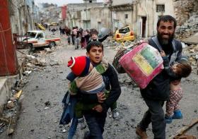 وزير الهجرة والمهجرين يعلن عودة نحو 122 الف نازح الى مناطقهم المحررة في الموصل