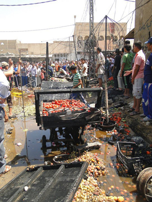 لقطة مصورة من تفجير سيارة في سوق التحدي بالديوانية