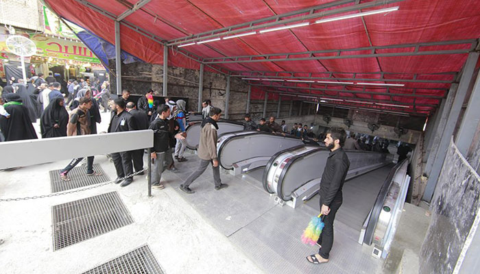 بالصور:افتتاح نفق باب قبلة الامام الحسين ذي السلالم الكهربائية امام زوار الاربعين بكربلاء