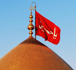 كربلاء:استبدال رايتي قبتي الإمام الحسين وأخيه أبي الفضل العباس الى الحمراء ايذاناً ببدء شهر ربيع الأول 1433هـ