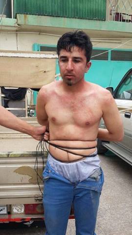 صورة للارهابي الذي اراد تفجير حسينية الحكيم وسط السليمانية بعد القاء القبض عليه