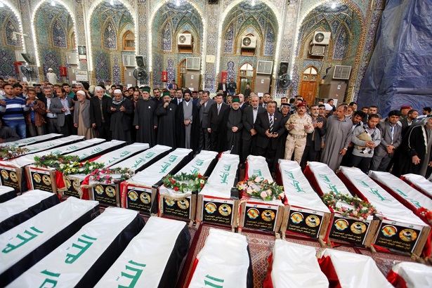 بالصور:مراسيم مهيبة لتشييع رفات خمسين شهيدا من المقابر الجماعية في العتبة الحسينية المقدسة