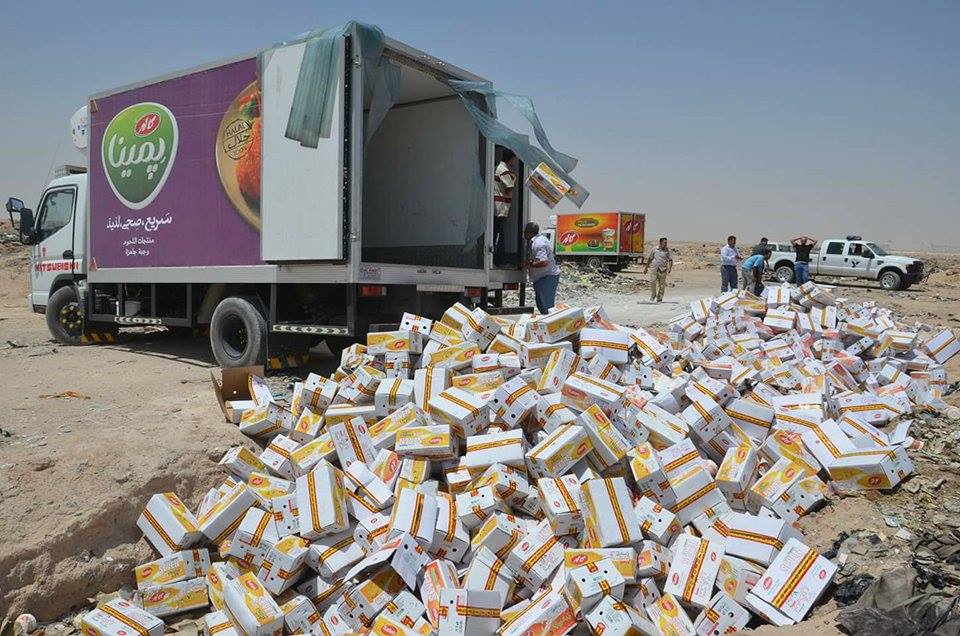 بالصور صحة النجف تتلف 20 طنا من الالبان الايرانية منتهبة الصلاحية