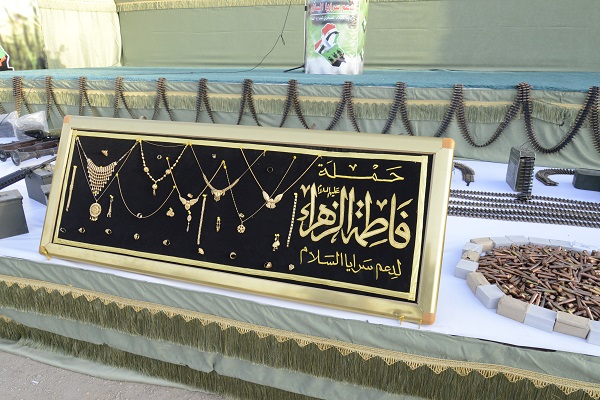 حملة تبرع بالذهب والمصوغات لدعم المقاتلين والمتطوعين في كربلاء المقدسة (مصور)