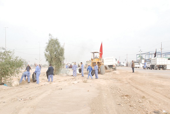 بالصور: بلديات كربلاء تجري استعدادات مبكرة لتنظيف مداخل المدينة الثلاث