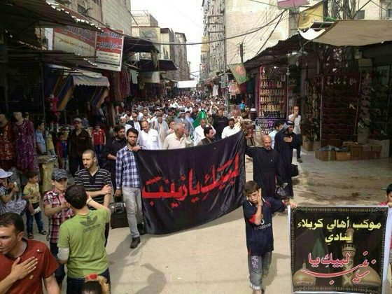 موكب أهالي كربلاء المقدسة في مسيرات بمنطقة السيدة زينب إحياء لذكرى وفاتها (مصور)