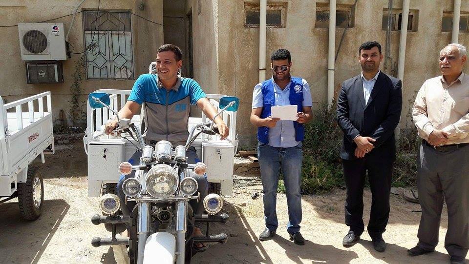 دائرة الهجرة في كربلاء: توزع عربات (ستوته) على المستفيدين في قضاء الهندية (مصور)