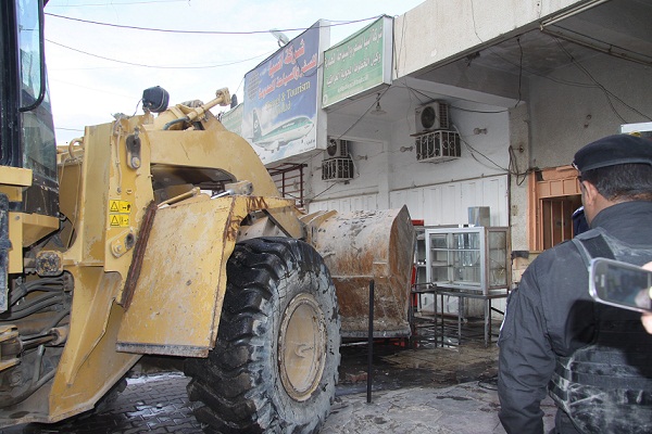 اغلاق اكثر من 15 مرآب غير قانوني في منطقة الاعظمية +صور