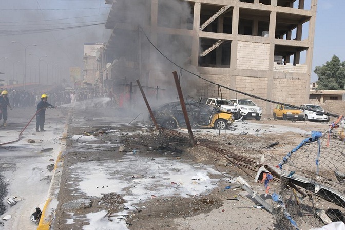 تقرير مصور لتفجير منطقة باب طوريج قرب كراج الموحد وسط كربلاء