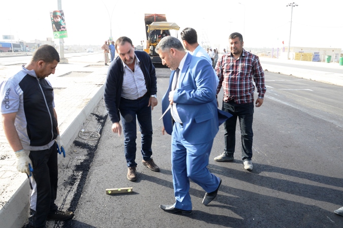 حكومة كربلاء المحلية تباشر حملة اكساء في الاحياء ومركز المدينة(مصور)