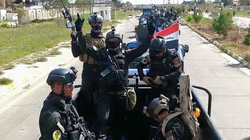 جهاز مكافحة الارهاب يحرر جامعة الانبار بالكامل ويرفع العلم العراقي فوقها