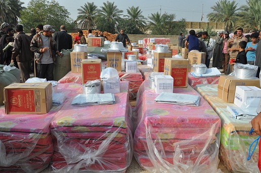 دائرة الهجرة والمهجرين في كربلاء المقدسة  توزع المعونات على العوائل النازحة من الامطار (مصور)