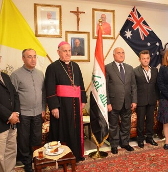 وضع العلم العراقي داخل كنيسة في استراليا بحضور السفير العراقي