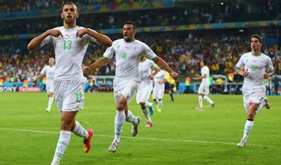 المنتخب الجزائري يحقق إنجازاً تاريخياً طال انتظاره ببلوغه الدور الثاني في مونديال البرازيل بعد التعادل أمام روسيا 1-1.