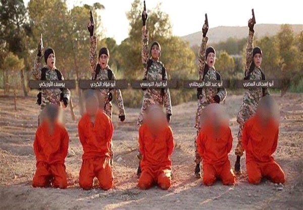 بالصوره:اطفال داعش يعدمون  أسرى كرد