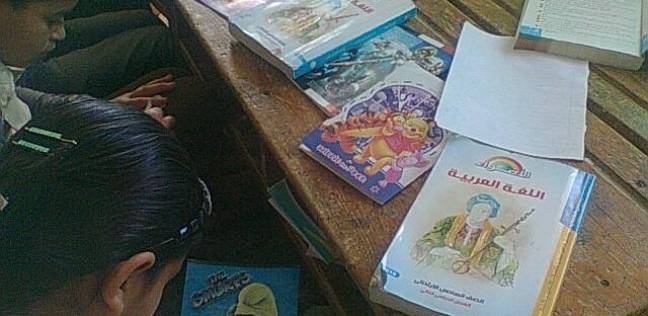 طلبة كربلاء يستنسخون المناهج الدراسية لعدم وجود كتب مدرسية بالمحافظة