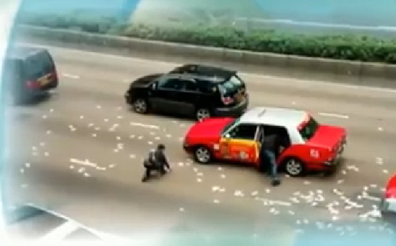 بالفيديو :شاهد ما الذي حدث عندما تطاير 1.600.000 يورو في شوارع هونغ كونغ