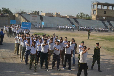 بالصور: تخرج الدورة الاولى من المتطوعين في النجف الاشرف