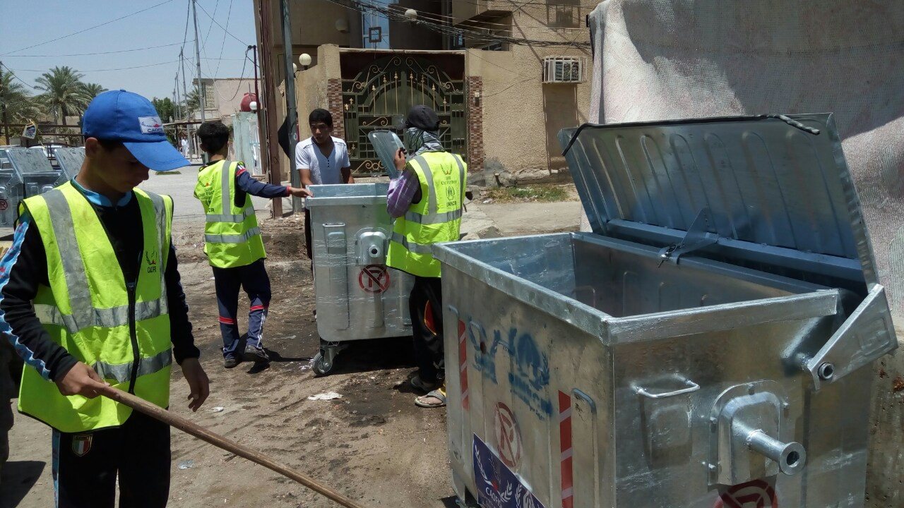 بالصور:منظمة كندية تنظم حملات مشتركة للتنظيف بالتنسيق مع بلدية كربلاء