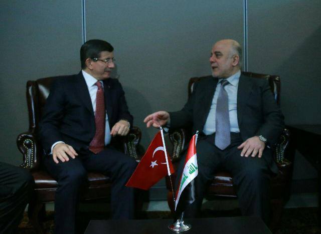 العبادي يبحث مع اوغلو قضية المياه والحرب على داعش