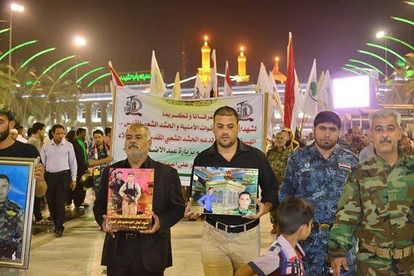 أبناء كربلاء المقدسة يزورون الامامين الحسين والعباس بالإنابة عن أبطال القوات الأمنية والحشد الشعبي