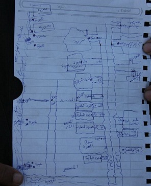 بالصورة:رسم تخطيطي يدوي لمناطق زراعة العبوات منها الجوامع والمدارس عثر عليها في جرف الصخر