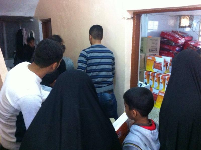 جمعية التعاون الخيرية في كربلاء توزع كسوة شتوية على شريحة الايتام