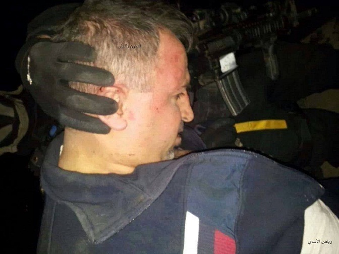 صورة حديثة للعلواني وهو في قبضة القوات الامنية