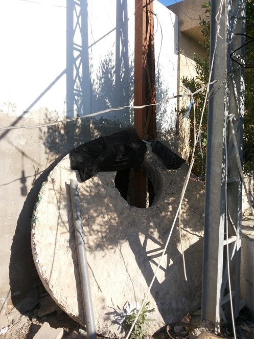 بالصور :عمود كهرباء يتسبب بذعر منطقة في كربلاء