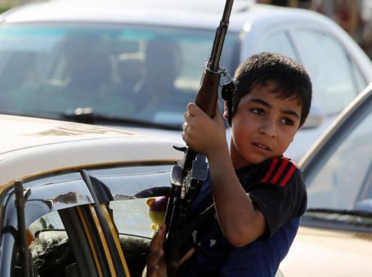 تقرير دولي :مسلحون في الموصل يستخدمون الاطفال دروعاً بشرية